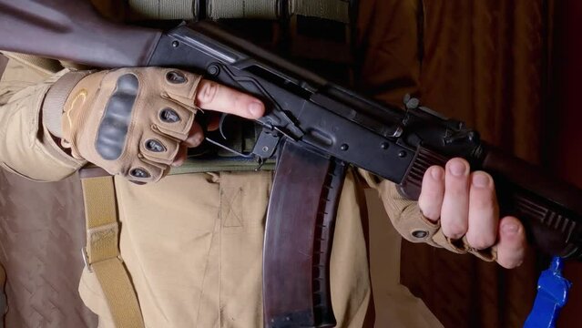 Removing from the safety lock and reloading of assault rifle