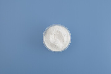 Sodium Carboxymethyl Cellulose Powder, NaCMC. Food additive E466 in bowl, top view. Stabiliser and...