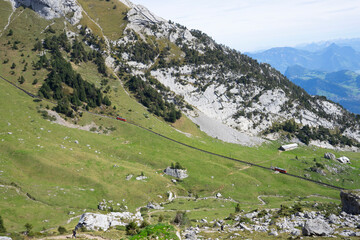 Fototapeta na wymiar Mount Pilatus and the valley station in Alpnachstad lie in the heart of Switzerland and are very well connected. They are conveniently reached by car, train or boat trip.