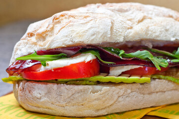 sandwich with mozzarella, tomato and bresaola