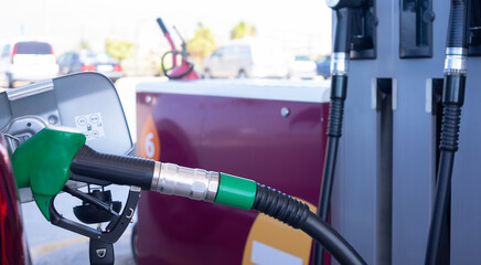 Filling fuel into the car tank at the pump service station, for concept transportation power...