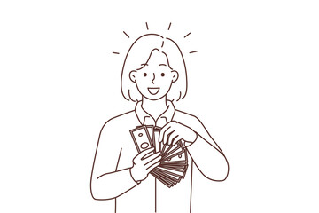 Smiling woman with money in hands 