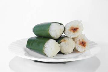 Lemper is a snack made from sticky rice, usually filled with shredded or chicken meat.