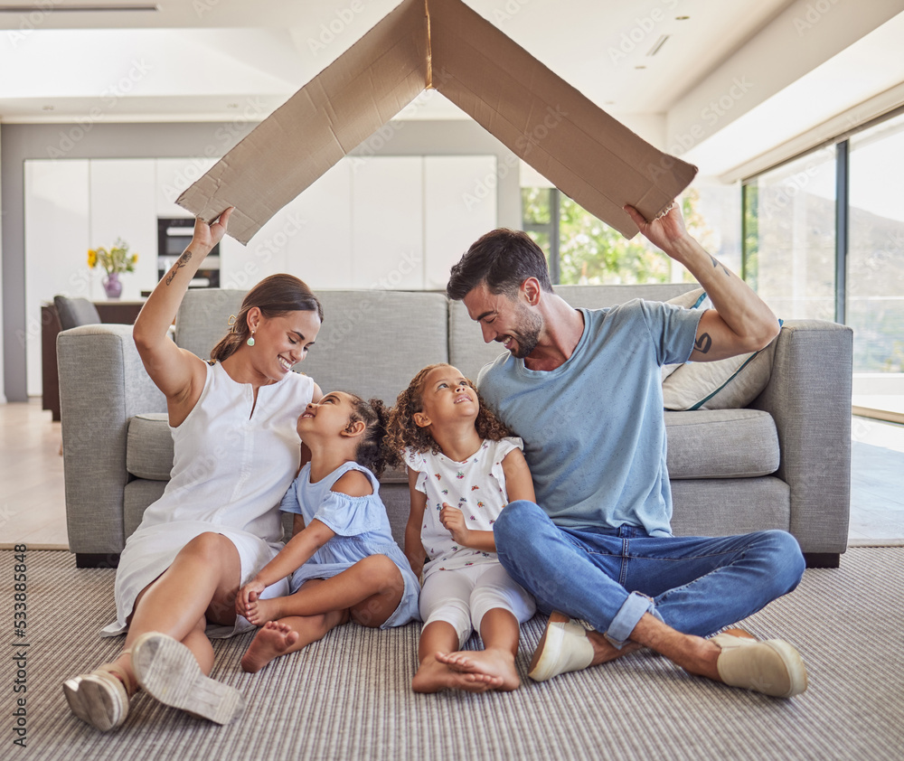 Poster Children security, family safety and parents with smile for kids, relax on living room floor of house and care in lounge together. Mother and father happy with girl siblings and cardboard roof