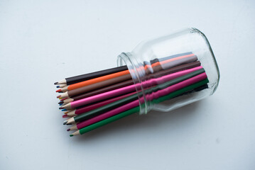 Fototapeta premium colorful pencils in a glass