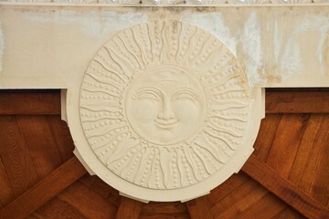 graceful beautiful historical bas-reliefs on the facade of the building