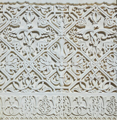 graceful beautiful historical bas-reliefs on the facade of the building