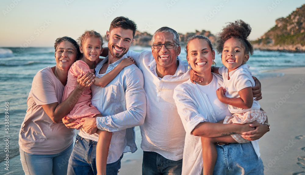 Wall mural Big family, happy and beach portrait of people with girl children by the sea at sunset. Happiness of a summer vacation with kids spending quality time together on the ocean water waves and sand