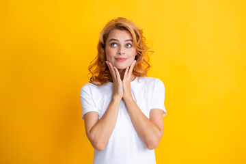 Surprised astonished young woman with open mouth. Female model face. Portrait of excited amazed gasping girl. Expressive facial expressions.