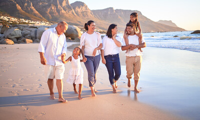 Naklejka premium Big family, children or girls bonding on beach on summer sunset holiday, social reunion or vacation. Smile, happy and walking parents, mom and dad with relax senior grandparents and kids in Cape Town