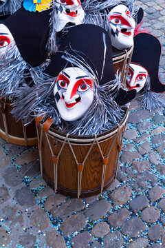 Switzerland, Basel, 7 March 2022. Close up of carnival masks and snare drums