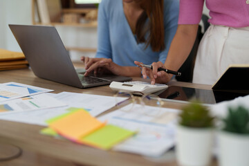 Group of Business woman and Accountant checking data document on laptop for investigation of corruption account. Anti Bribery concept