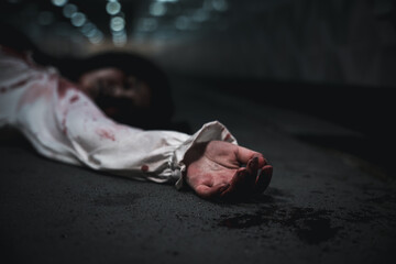 Closeup hand with blood of horror bloodthirsty ghost woman on floor, Homicide female hands jerky in...