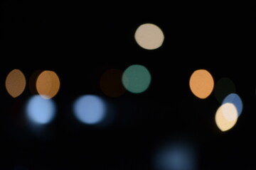 Abstract background. blur bokeh. Blurry multicolor light from the lamp in the distance