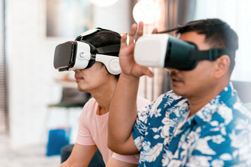 excited happy friends play vr glasses. future gaming technology device make male players enjoy competitive each other for fun. brothers wearing innovation virtual reality headset join in cyber world