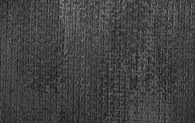 Gray background of decorative plaster with abstract spots. Unusual silver wall texture with beautiful patterns, creative surface background. Dressing coating for building cladding.