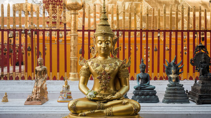 Meditating Buddha statue at the ancient Wat Phra That Doi Suthep temple in Chiang Mai, Thailand. 