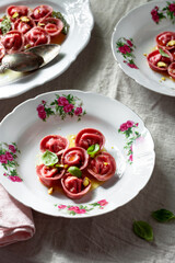 Beetroot ravioli with goat cheese, mozzarella, parmesan, butter sauce