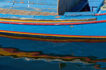 colofull old fishing boat in Olhao harbor
