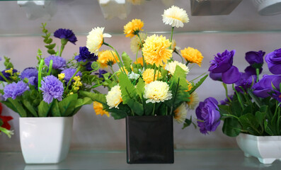 Beautiful and colorful flowers are arranged in a row.