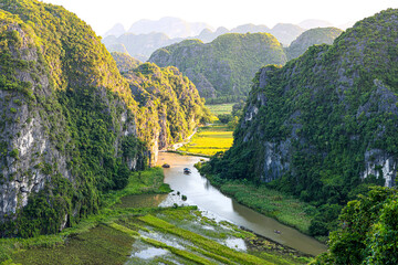 Beautiful scenery with the Tam Coc Dharma Boat Ride, Ninh Binh, Vietnam