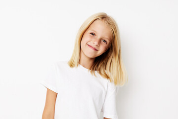 Fototapeta premium Portrait of a smiling little cutie fashionable baby clothes posing studio