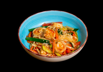 egg noodles wok with vegetables on a black background