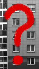 Large red question mark on residential building monochrome background. Rising price for purchase,...