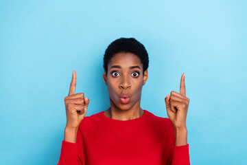 Photo of hooray millennial brunet guy index up wear red shirt isolated on blue color background