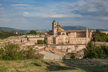Fototapeta na wymiar Aerial panorama of the Ducal Palace of Urbino medieval walled town and university in Marche, Italy a popular travel destination