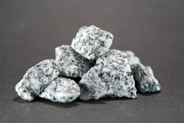 Granite is rich in quartz, mica and feldspar coarsely crystalline plutonic rock