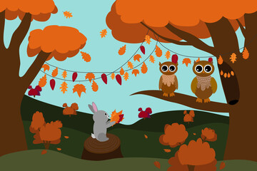 Owls in the autumn forest. the bunny gives the collected leaves to the owls.