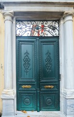 The gate to the old city house. Urban architecture in Europe.