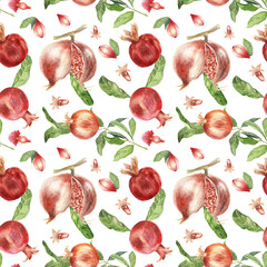 Seamless pattern of pomegranate fruit watercolour painted. Pomegranate fruit isolated on white with buds, flowers and green leaves. Branch with leaves of pomegranate.