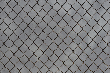 Metal fence on concrete wall, texture and background graphic resource