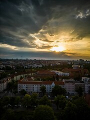 Obraz premium Vertical shot of modern buildings in Berlin, Germany at sunset