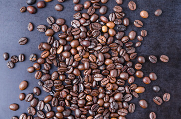 International Coffee Day Coffee beans on dark background, close-up still life
