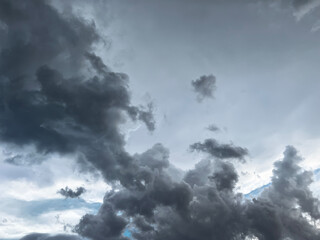 The backdrop of a summer sky before the storm. Natural background with soft clouds.