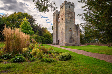 Fototapeta na wymiar Preston Pele Tower and garden, which is a 14th century bastle of medieval construction located in Northumberland near the coast and was a fortified dwelling for protection against the Border Reivers