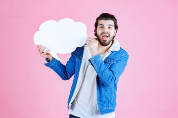 Man holding a cloud shape blank thinkboard and having fun