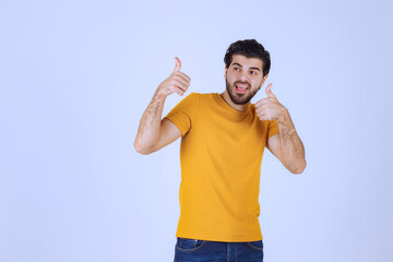 Man showing thumb up hand sign