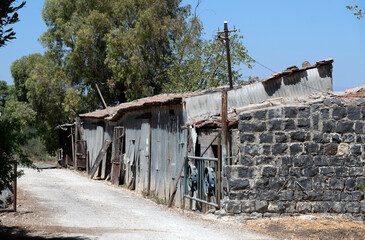 Old buildings of stone and metal in old northern Israeli town