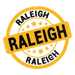 RALEIGH text written on yellow-black round stamp sign.