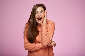 Excited surprising woman isolated female portrait. on pink background.