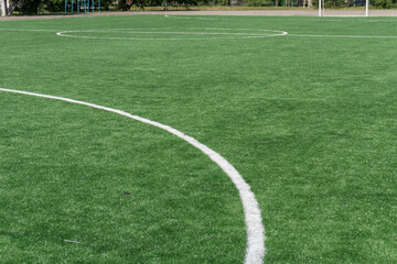 Marking on a modern stadium with artificial turf. School stadium.