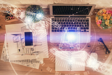 Double exposure of data theme drawing hologram over topview work table background with computer. Concept of technology.