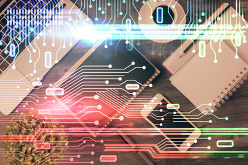 Double exposure of technology theme drawing over work table desktop. Top view. Global data analysis concept.