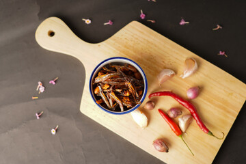 Peanut fried anchovy. Traditional recipe. Onion, garlic and chili.