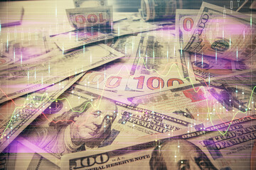 Multi exposure of forex chart drawing over us dollars bill background. Concept of financial success markets.