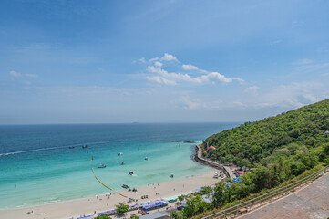 Chonburi.thailand 07.05.2022.Landscape view of tawean beach with crowded of tourist on the beach in cloudy day.Tawaen Beach is the main Beach on the popular Koh Larn Island.